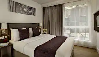 Citadines Trafalgar Square Hotel bedroom
