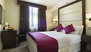Grand Royale Hyde Park Hotel bedroom